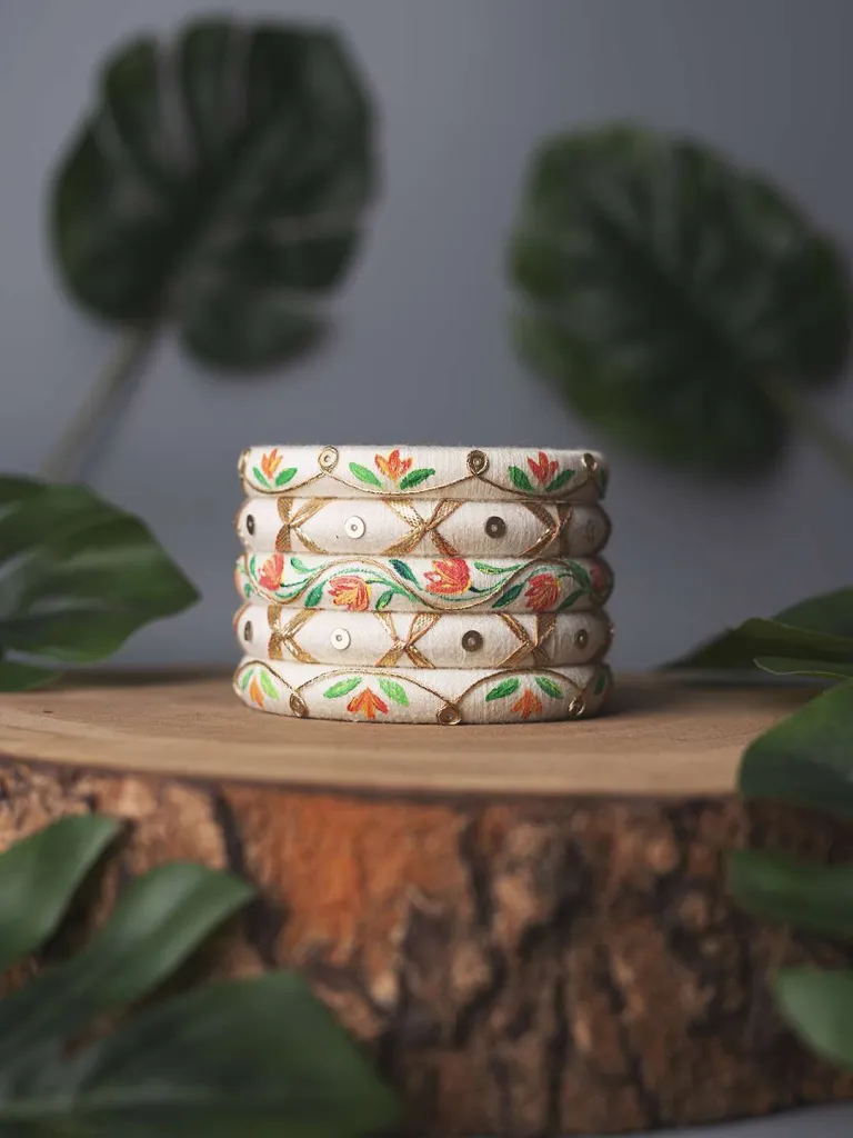 Yashi Off White and Golden Floral design Handpainted Bangles